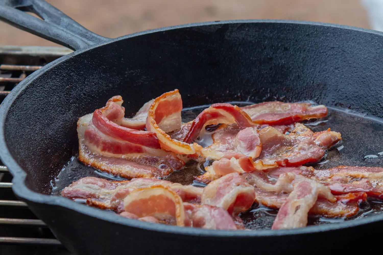 Sizzling Bacon in a Pan